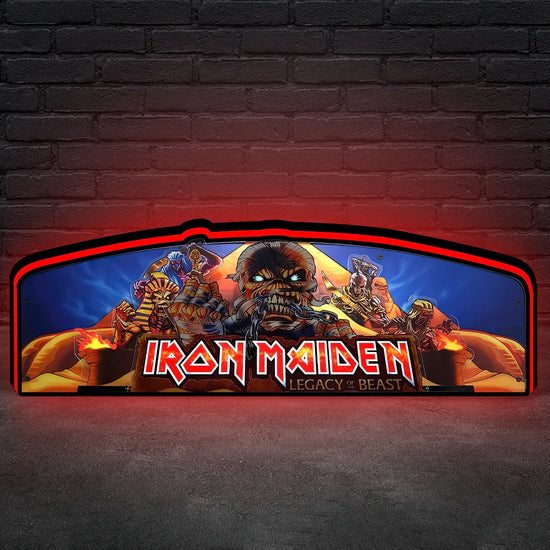 An Iron Maiden themed pinball topper LED lightbox displaying the band's logo and iconic imagery in a dark setting.